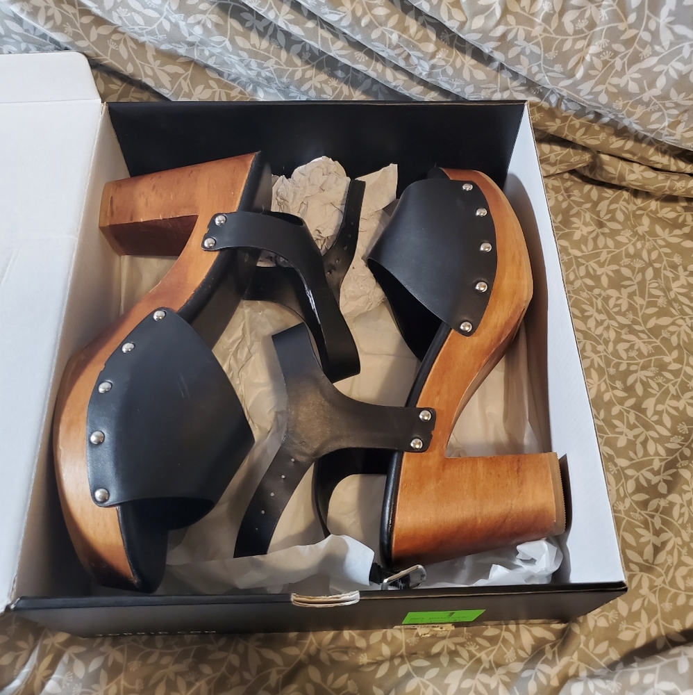 Torrid Wood Bottom Sandles size 11